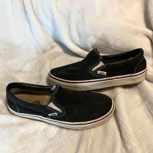 Black and white slip on vans